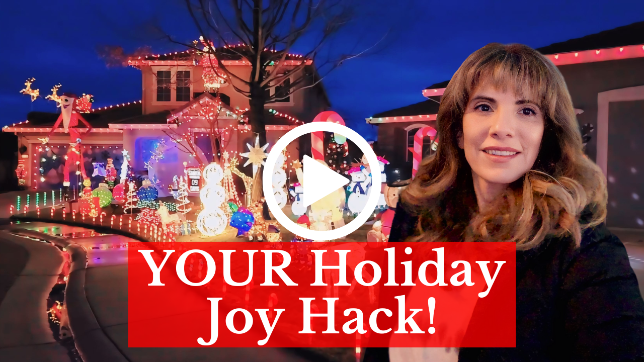 Carmen Hecox stands in front of a house adorned with colorful holiday lights at night. Text reads, "YOUR Simple Steps to Overcome Holiday Loneliness!" with a play button icon.